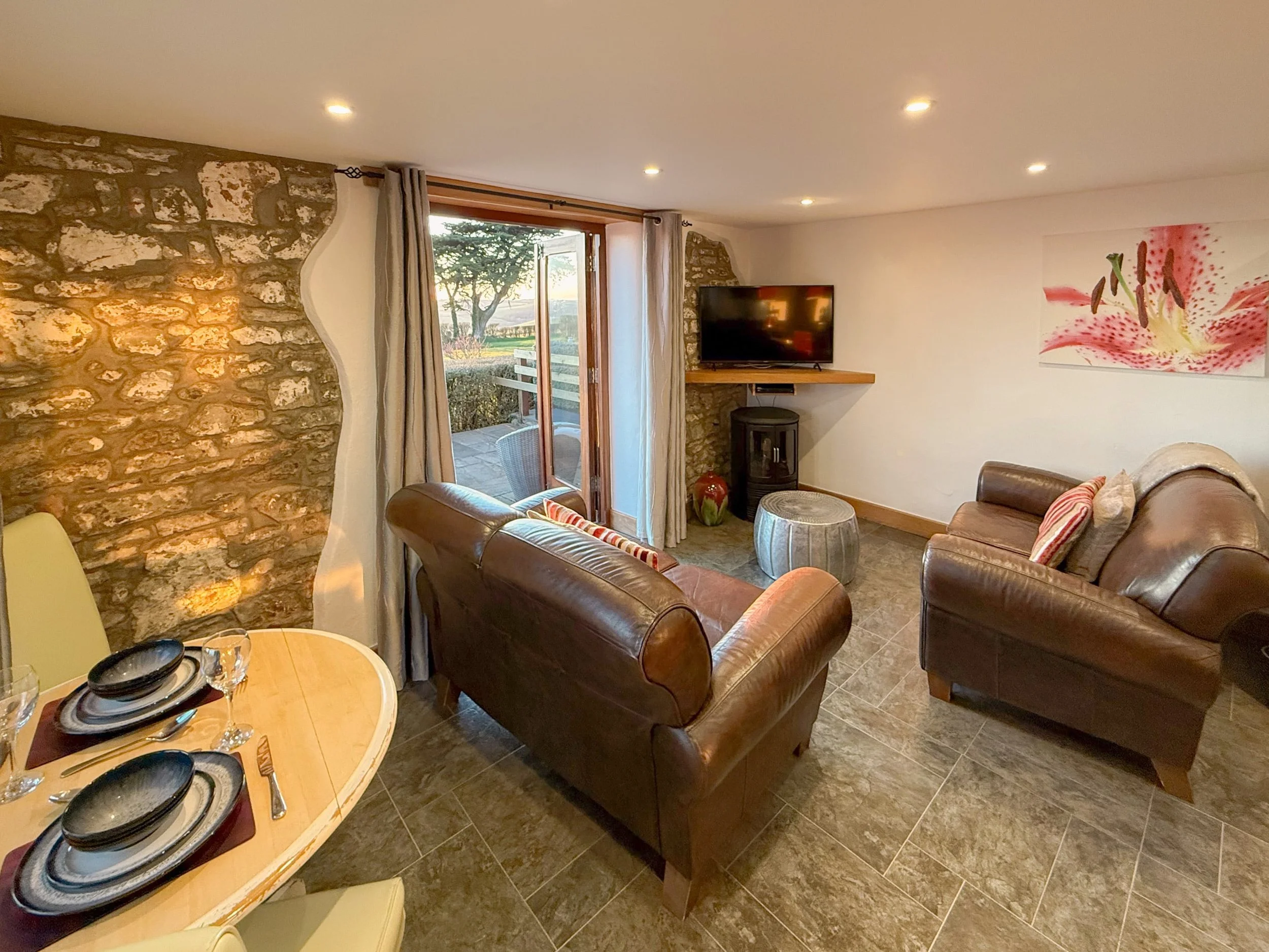 Dining and living area for two with Smart Television