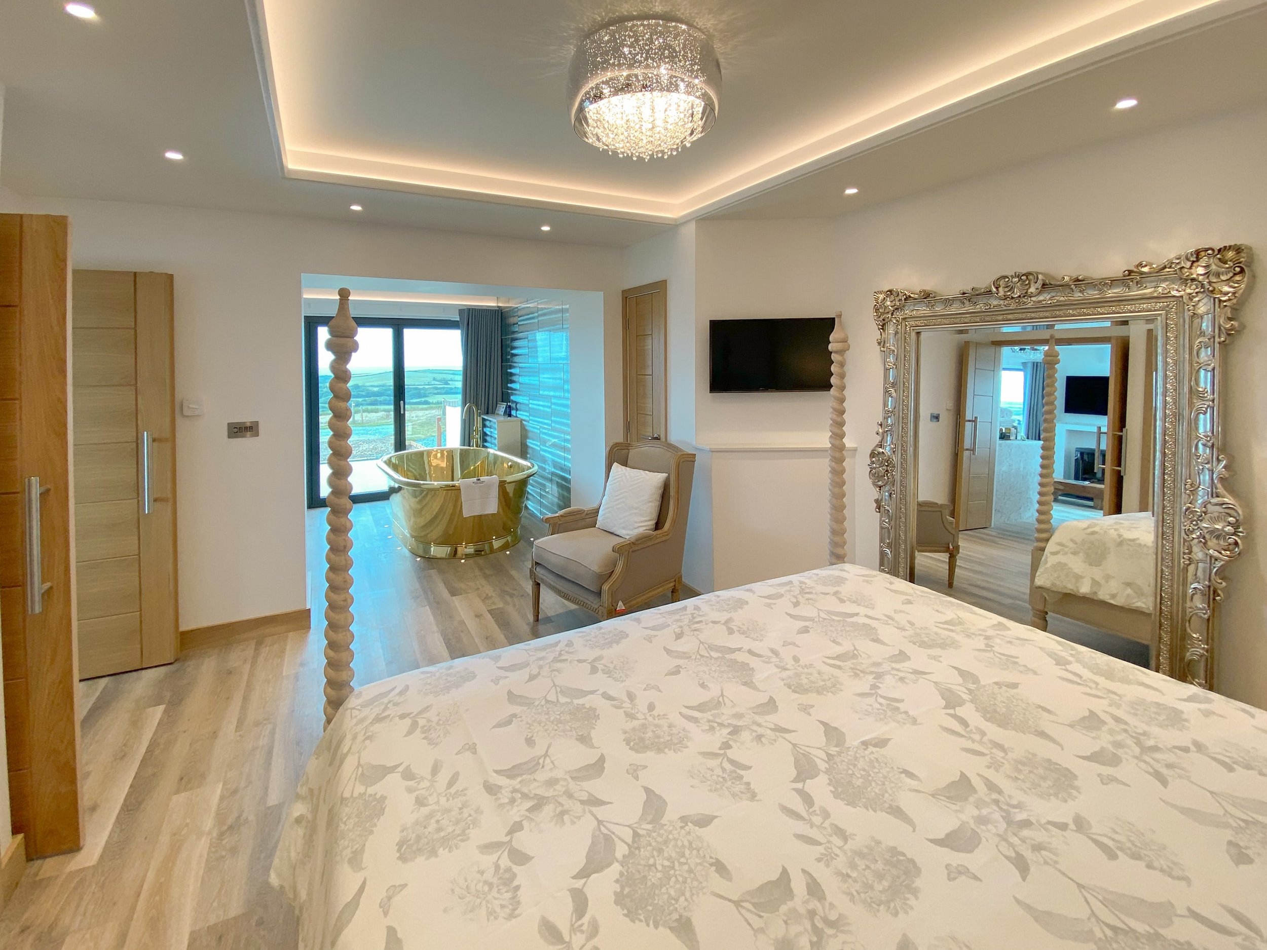Bedroom with brass air-spa bath and sea view