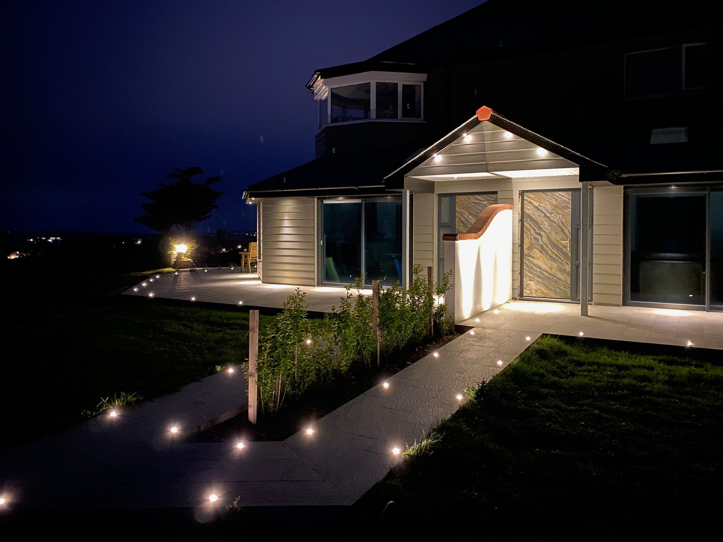 The View and Little Gem apartments at night with romantic lighting
