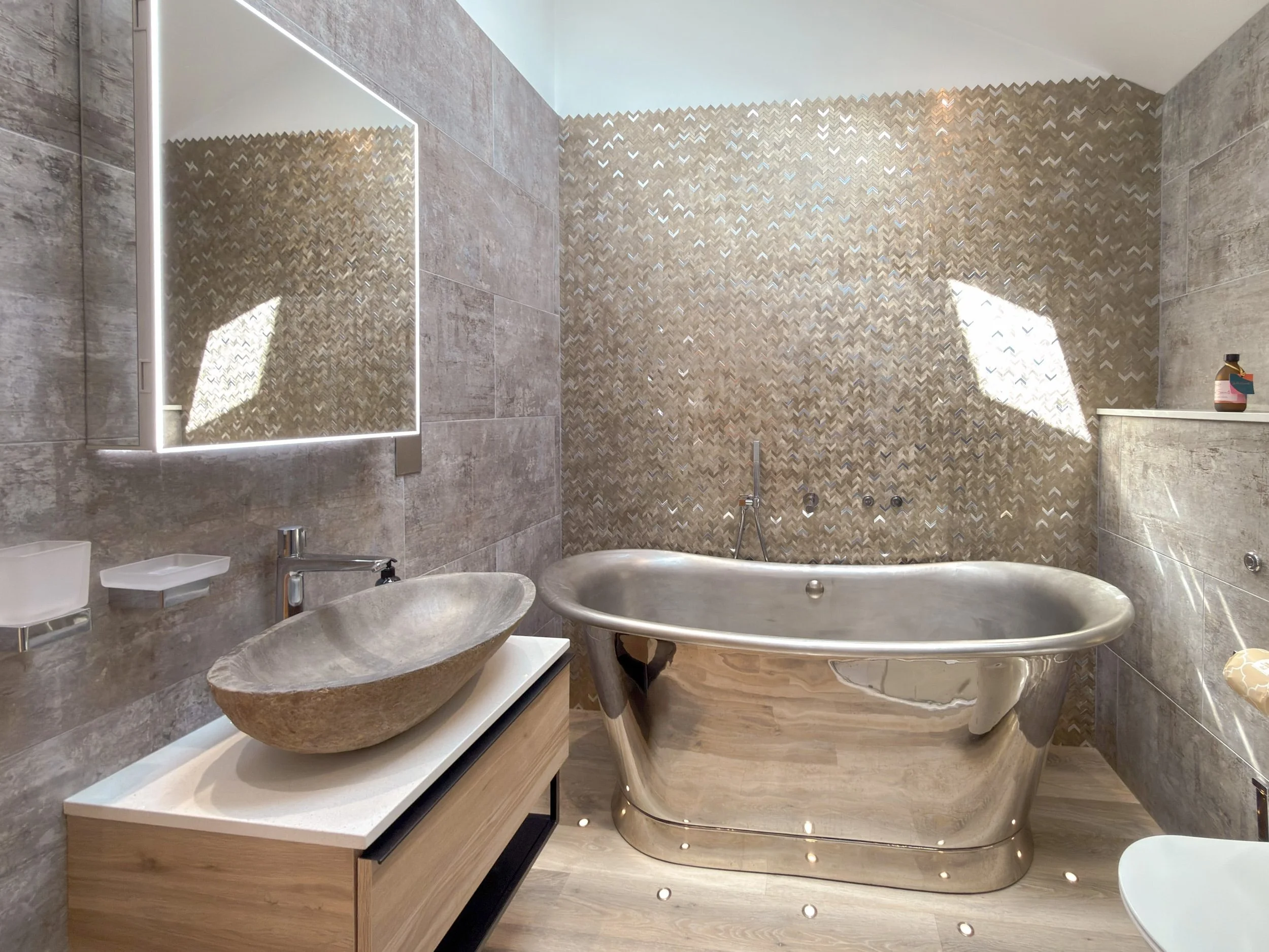 Nickel and brushed nickel freestanding bath with Sensori controls