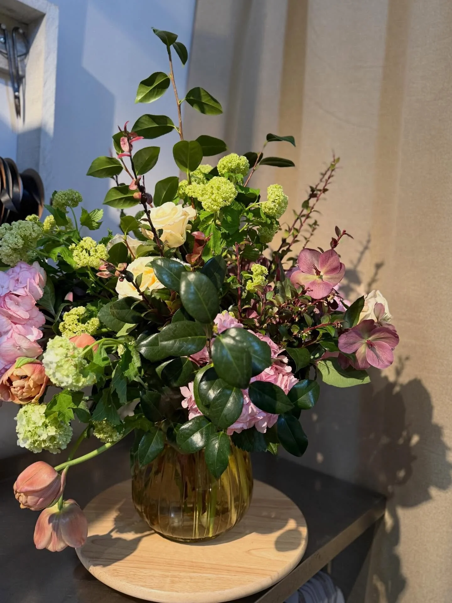 Classy spring arrangement. Open at 10am.