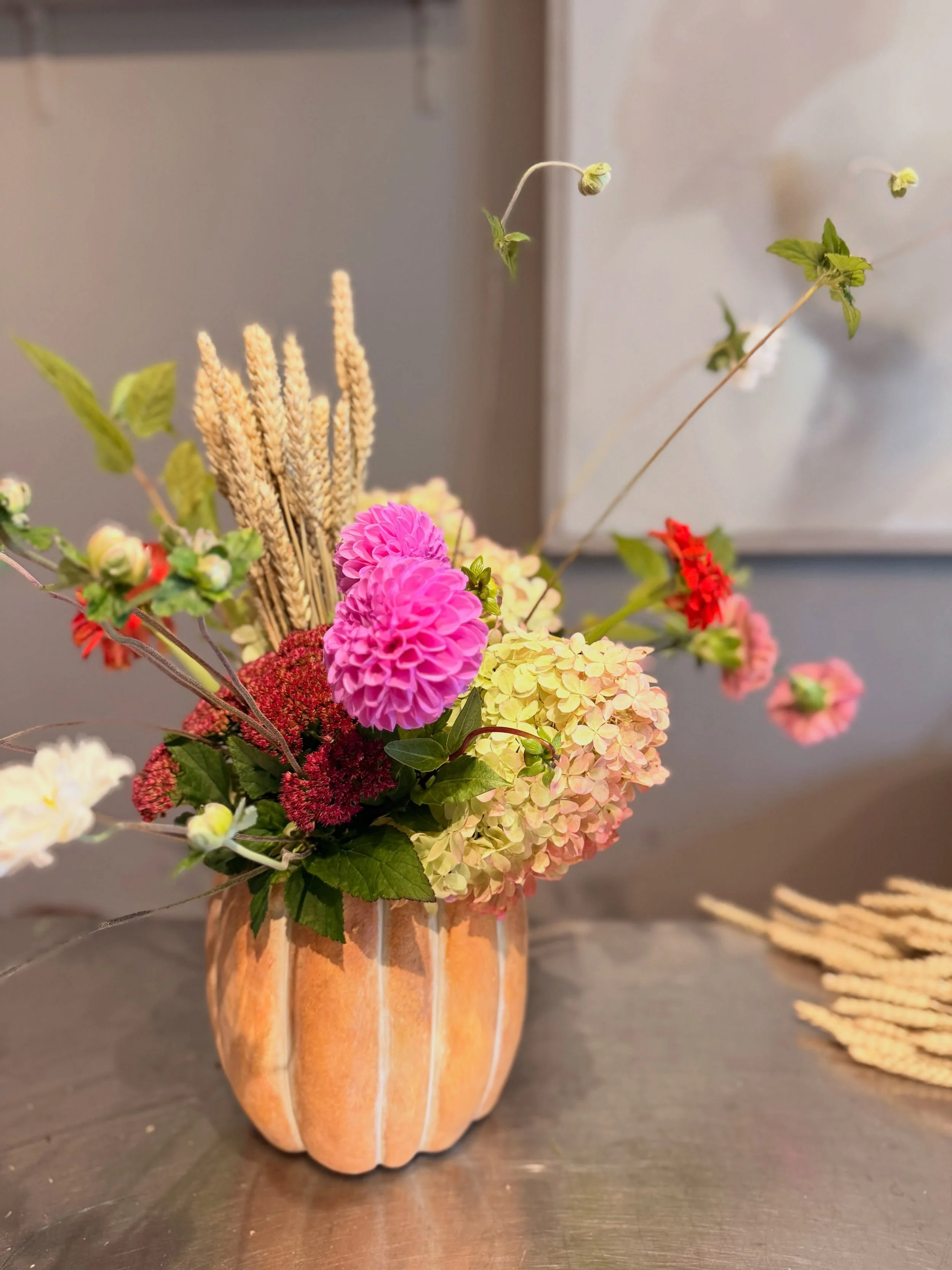 Little frost but yes we still have some fall days ahead. Enjoy this cute pumpkin arrangement.
