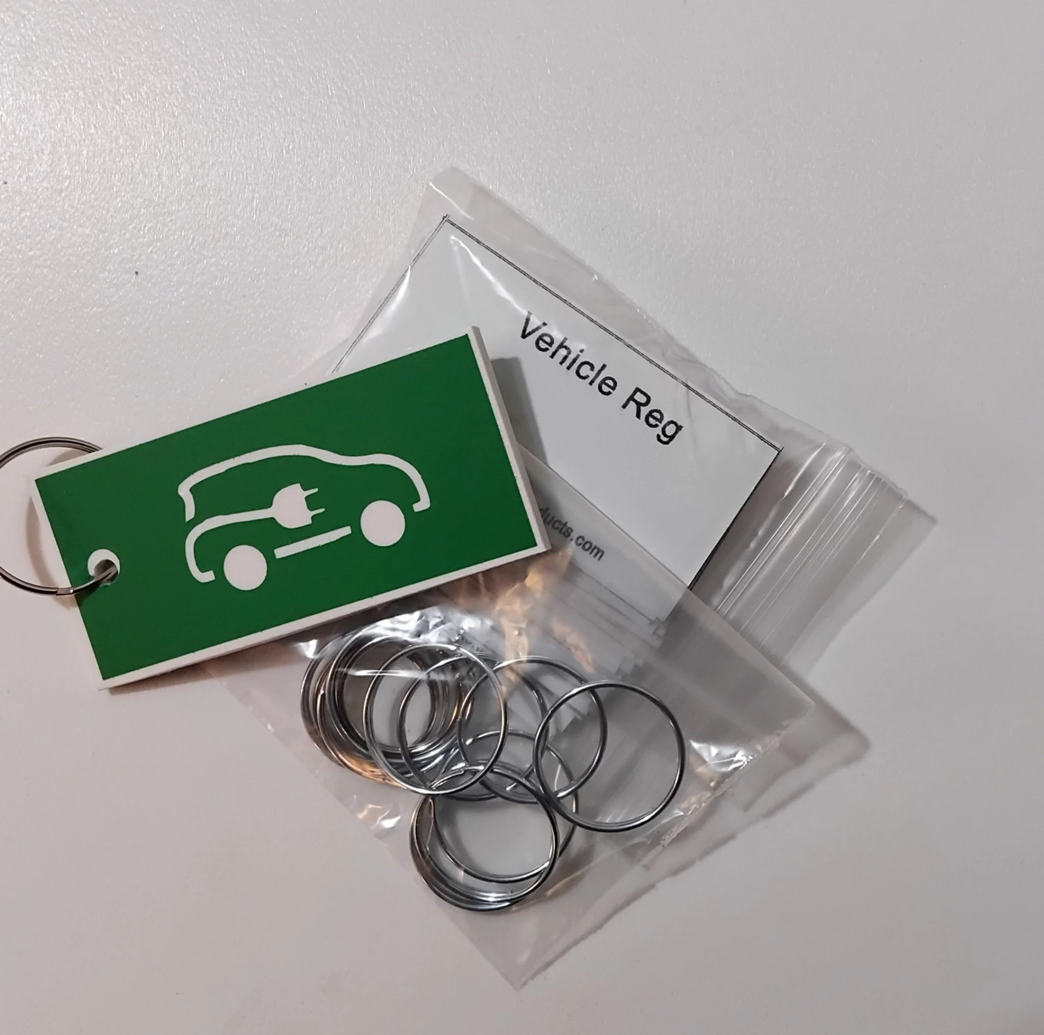 EV Vehicle Key Tags (12 pack) and 50 vehicle reg stickers