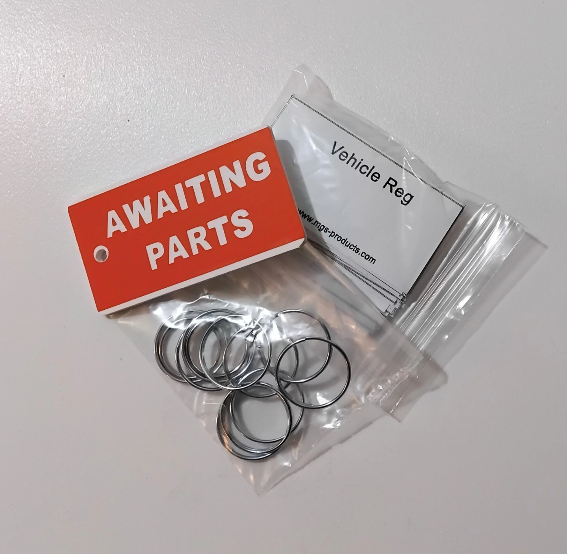 Key Tags Awaiting Parts Qyt 12 with 50 Vec Reg Stickers