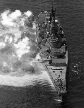 "What these men saw was the Nevadawreathed in clouds of her own amber smoke, uprooting gun emplacements, scattering pillboxes, and smashing tank and troop concentrations, but what you, as the only newspaperman aboard this American battleship in…