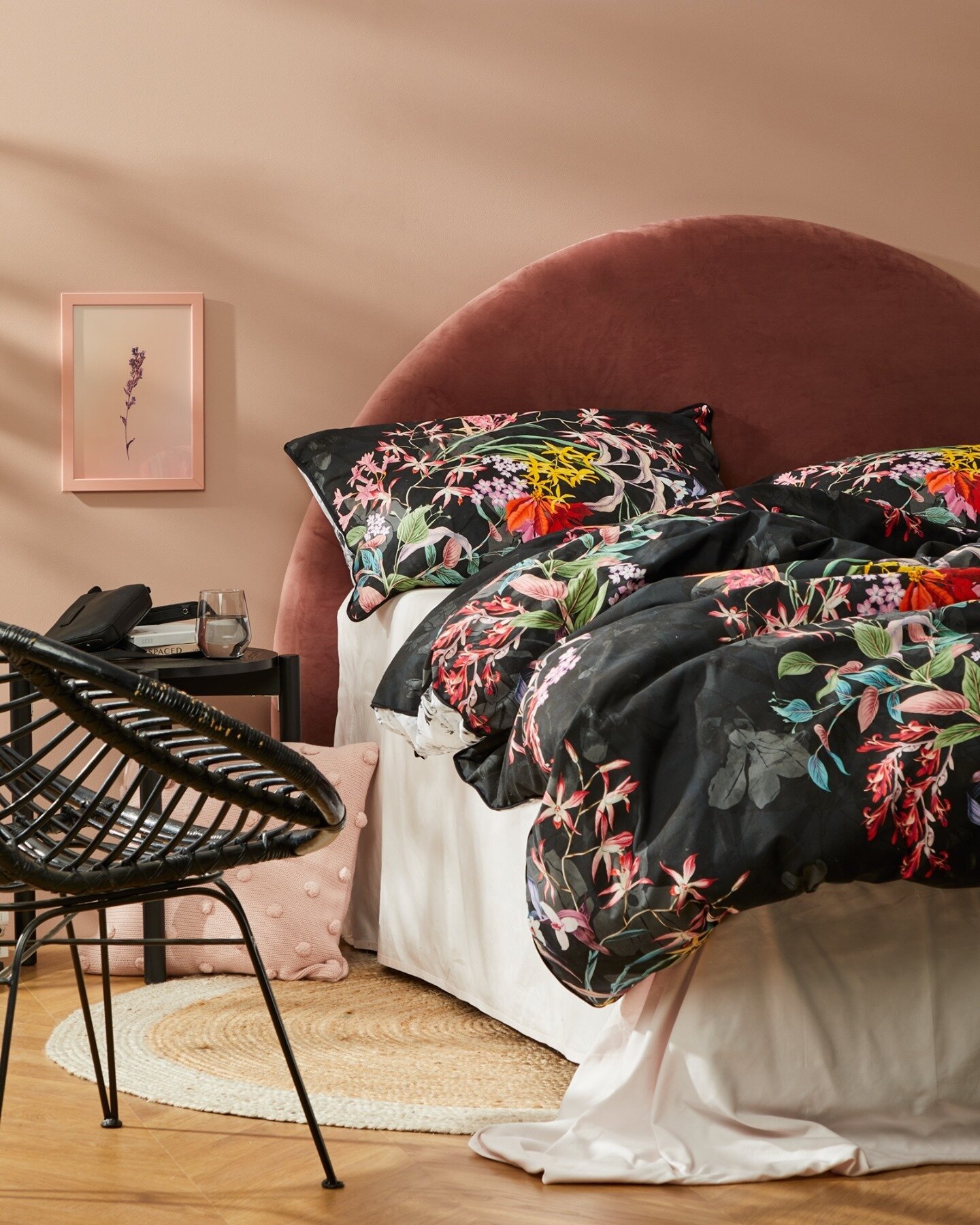 Brightly coloured flowers pop against the dark⁠
background of @loganandmason_'s Dendy Black. ⁠
⁠
This style takes on a contemporary feel paired with a modern bedhead, but looks just as striking with a deep grey palette.⁠
⁠
#dendy #spotlight