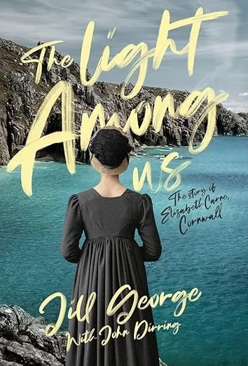 Woman standing by a body of water with rocky cliffs in the background, facing away. Overlay text reads 'The Light Among Us: The story of Eyeball Carroll Cornwall' and 'Jill George with John Dinning'.