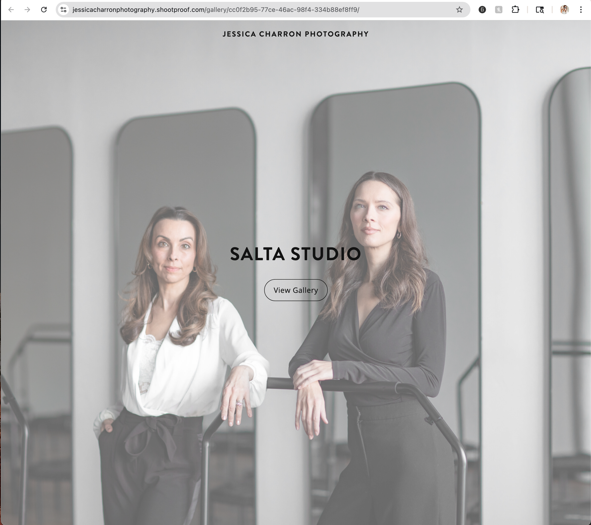 Image of a completed gallery with two women standing in their fitness studio.