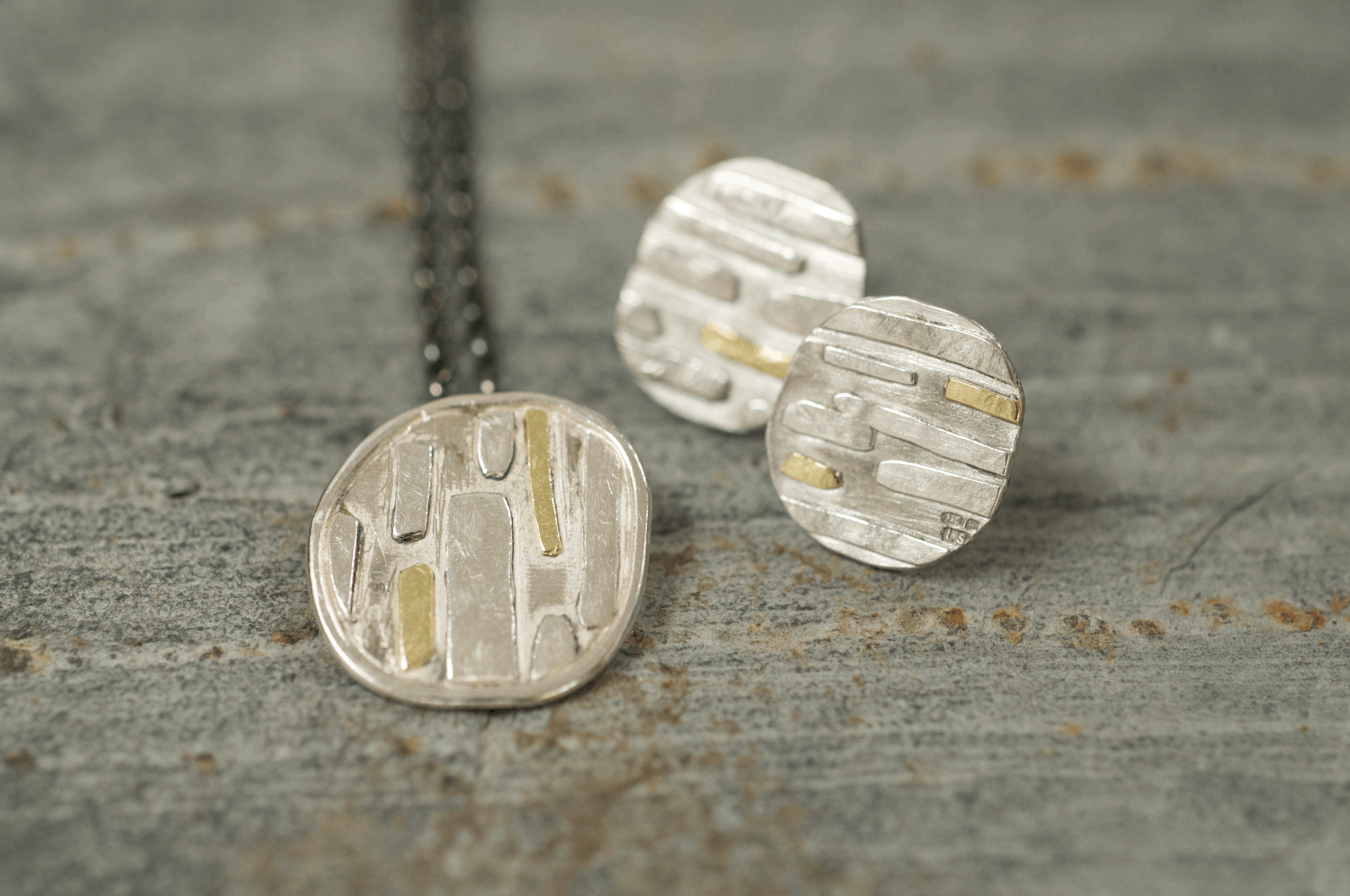 Mylor pebble silver and gold pendant