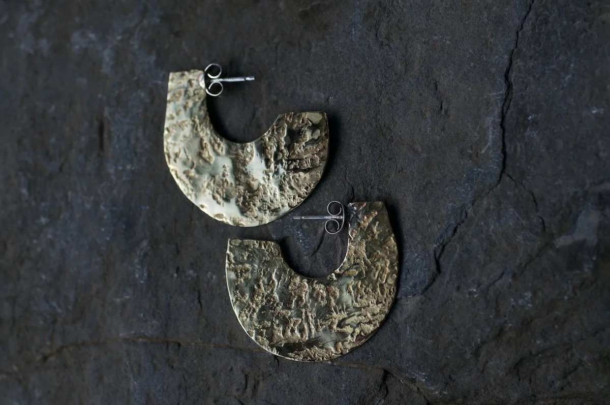 Granite hammered brass hoop earrings.jpeg