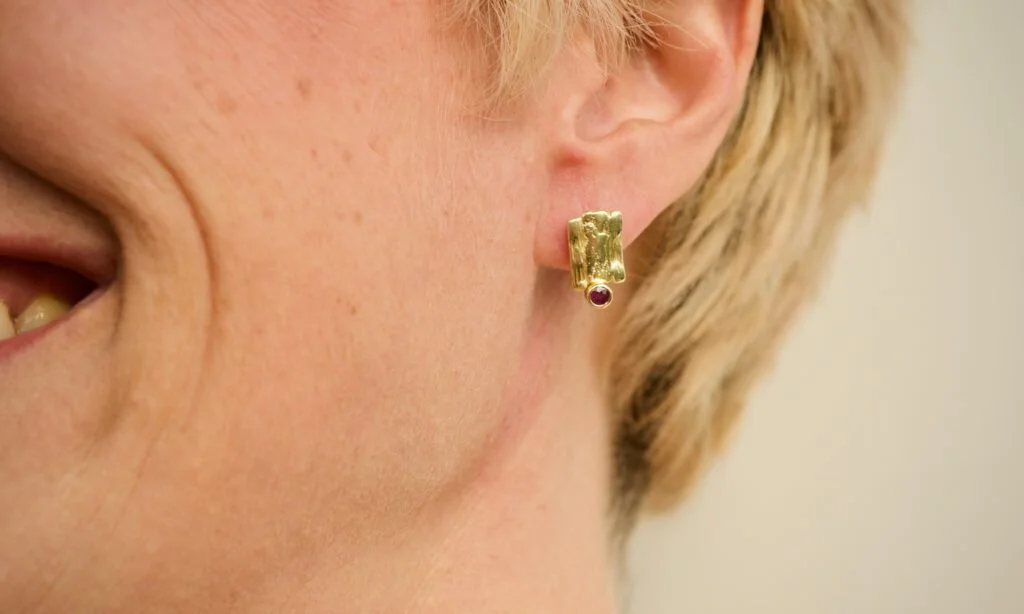 textured gold stud earrings with tourmalines