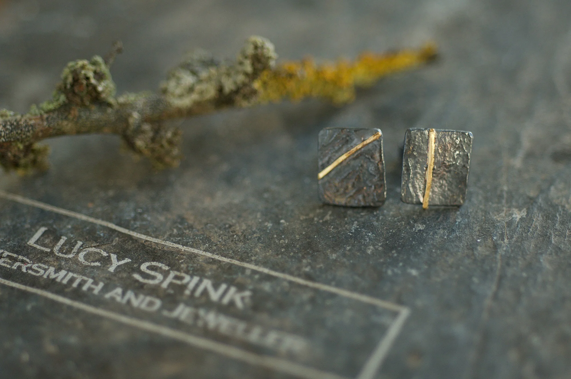 TEXTURED MONOLITH STUDS WITH GOLD SEAMS