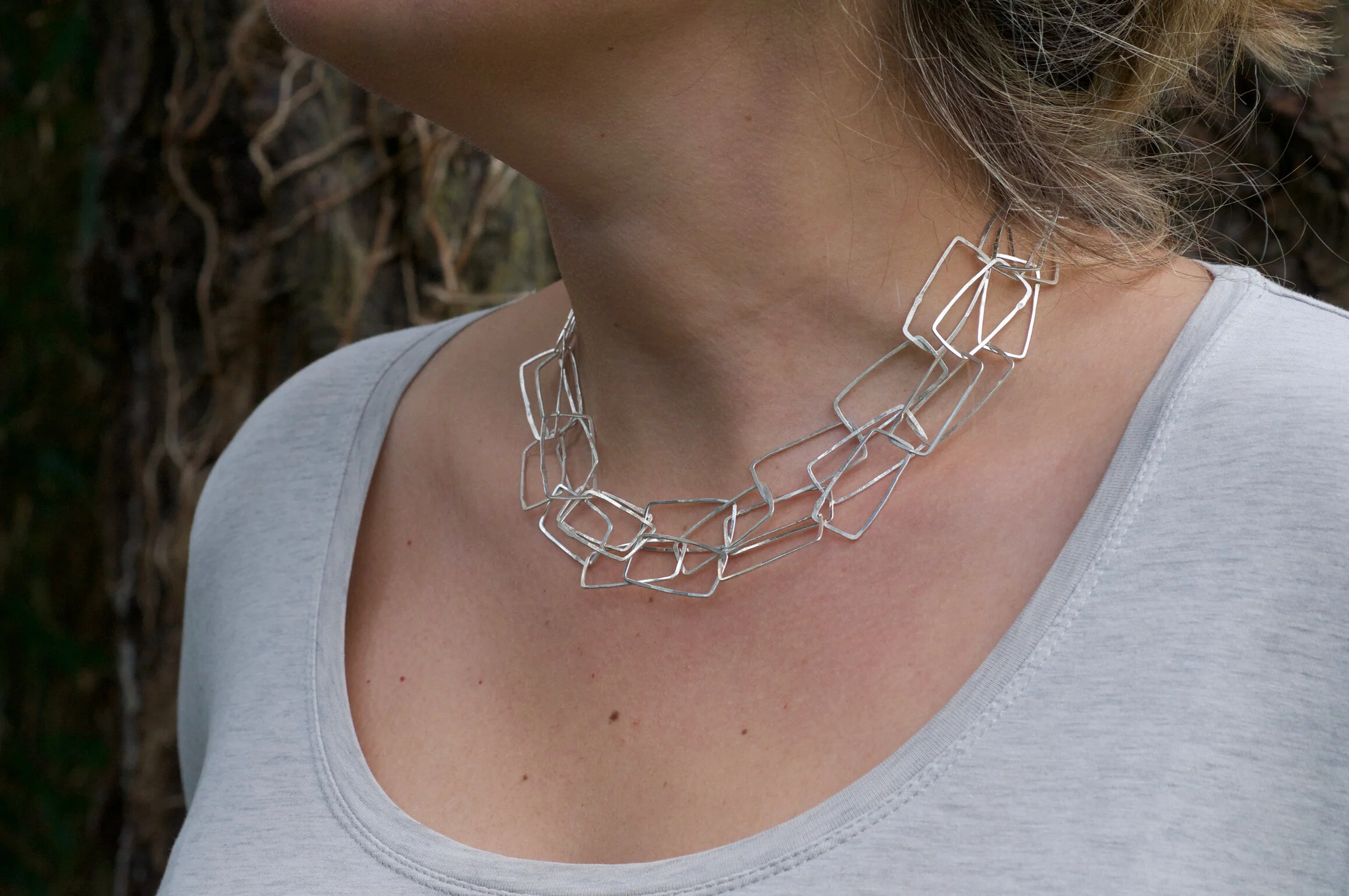model Monolith triple necklace