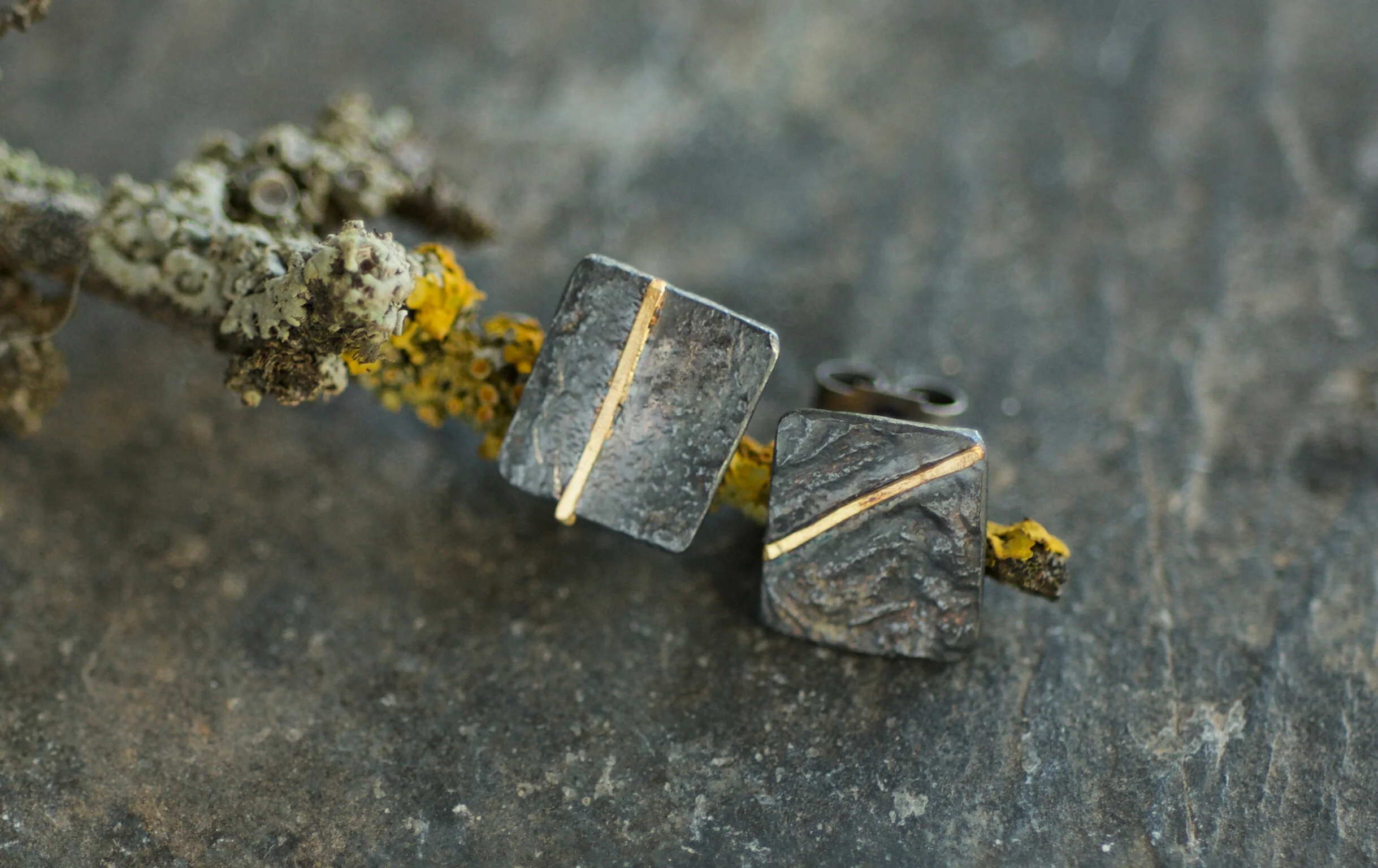 Textured Monolith Studs with gold seams