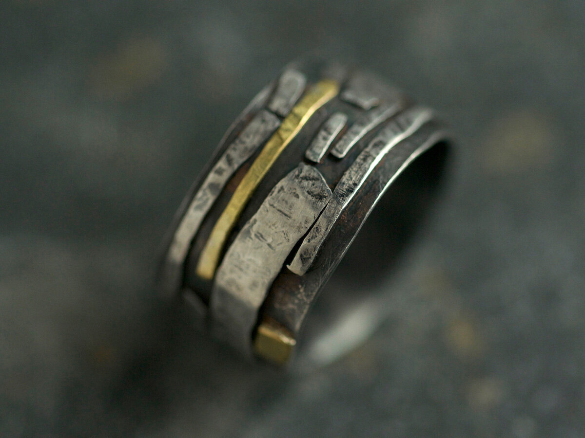 Jewellery inspired by nature Unusual handmade ring with black gold and silver lines like rocky outcrops or tree bark
