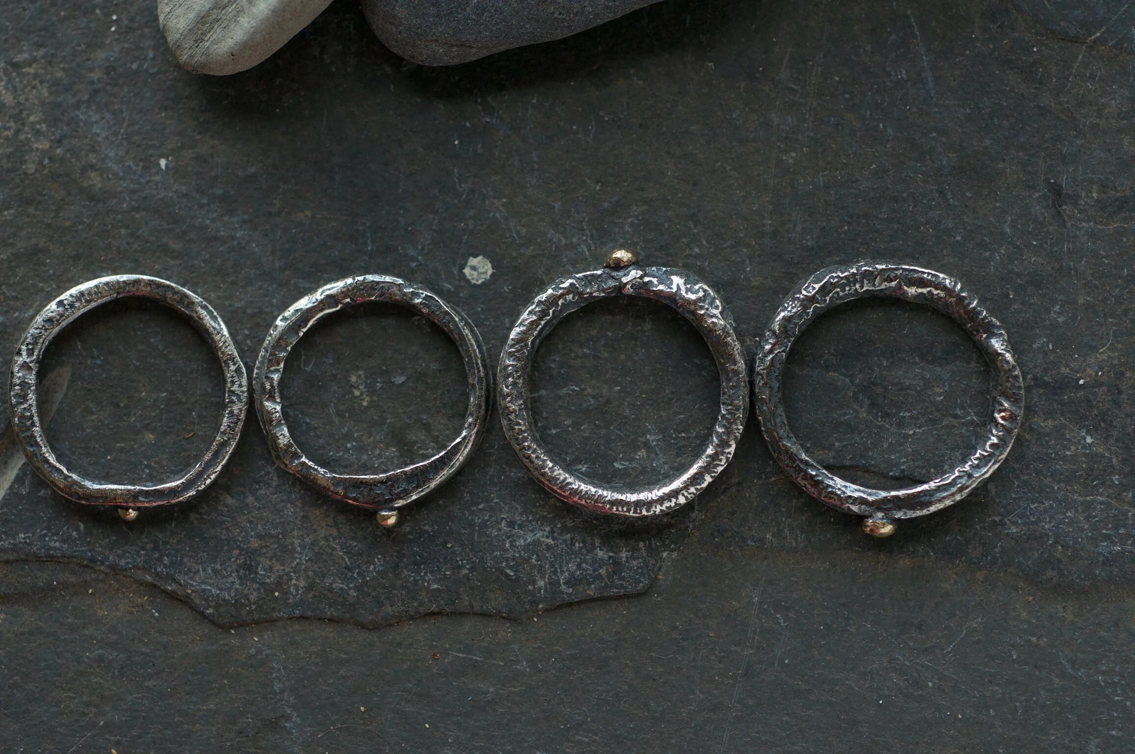 oxidised silver and gold rings