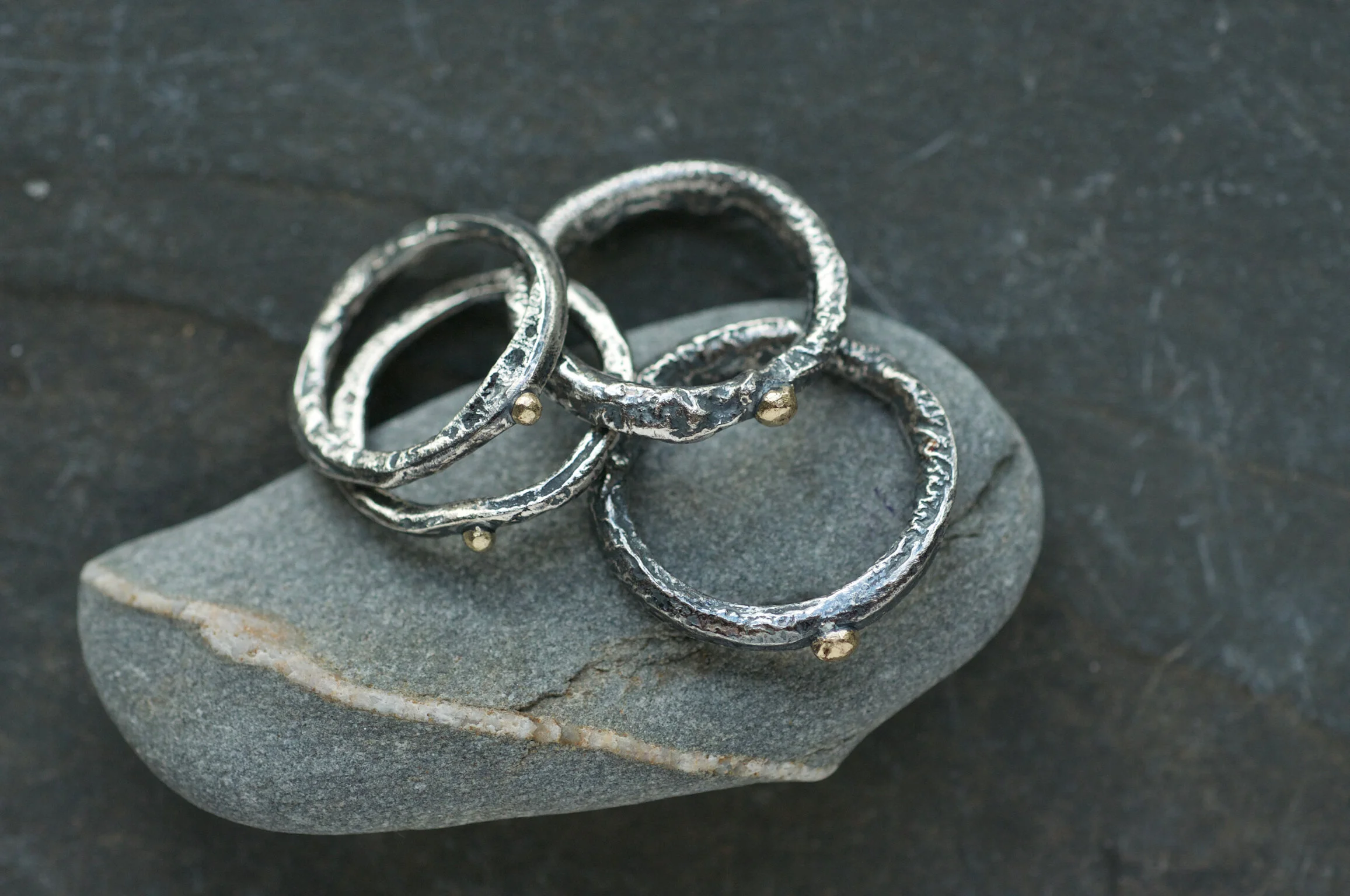 Black and gold rings