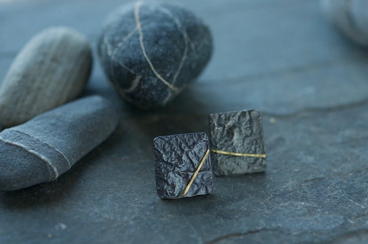 Oxidised silver and gold square studs line.jpg