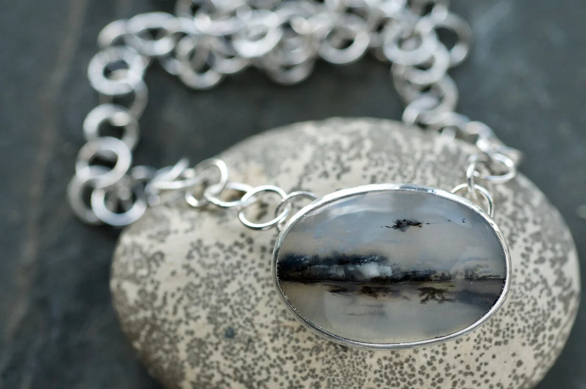 Oval dendritic quartz on silver chain detail.jpg