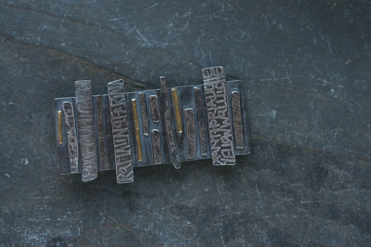 Lichen wall brooch with layers of silver and gold on slate (Copy)