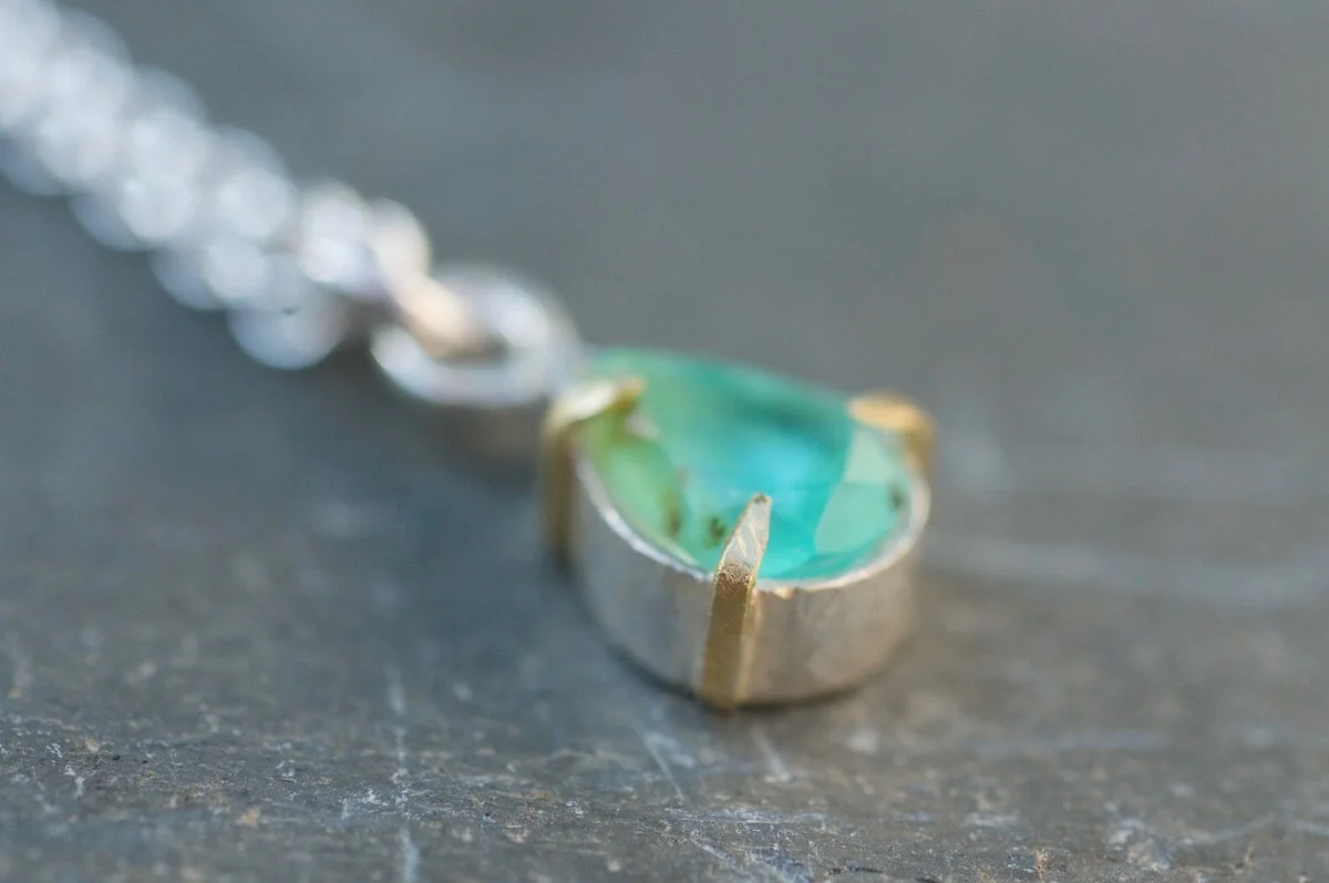 Peruvian Blue Opal pendant with gold claws