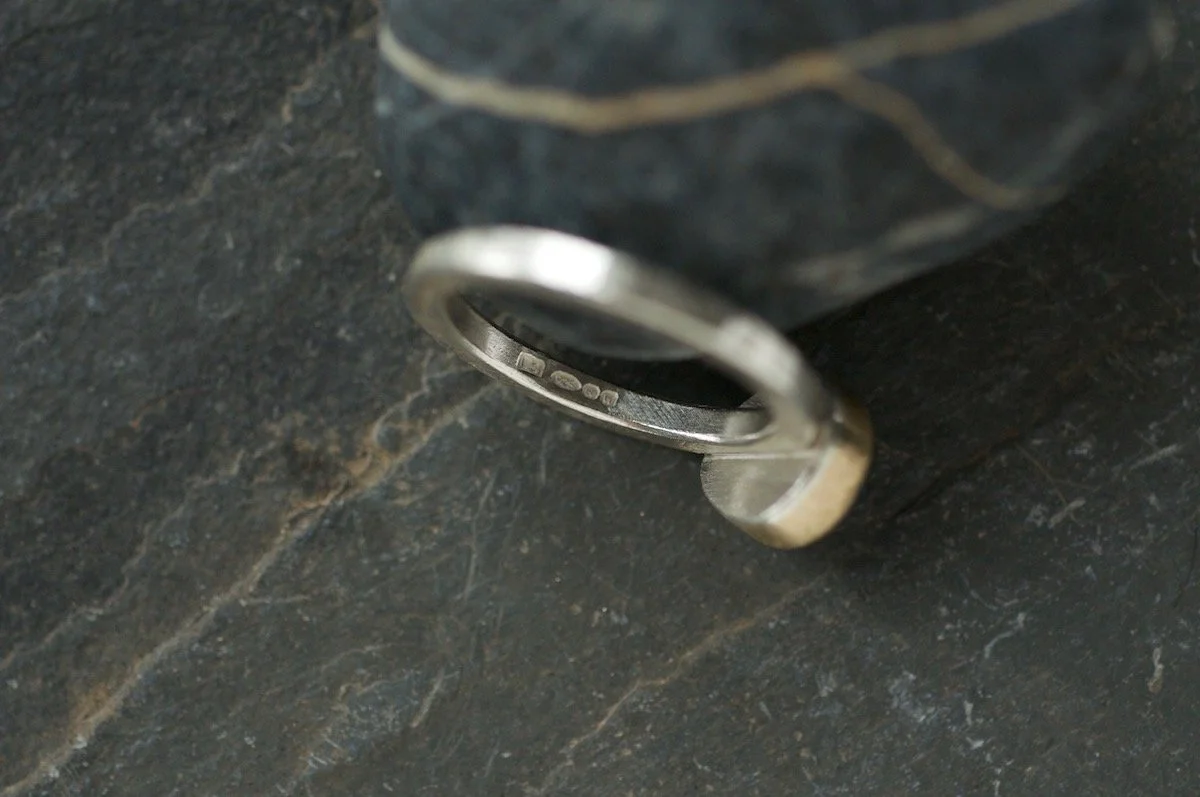 9ct gold and silver tanzanite ring hallmark.jpg