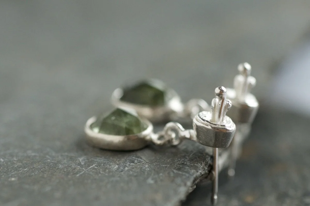 Mini lichen cluster earrings with peridot viewed from the side