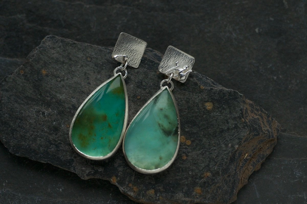 Statement Peruvian blue opal earrings with silver studs on slate