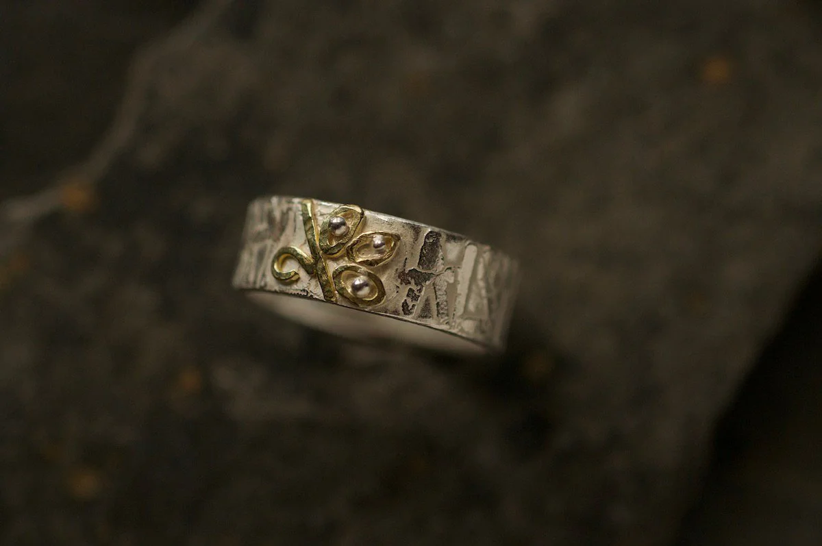 Comission-ring-etched-with-gold-leaf-design.jpg