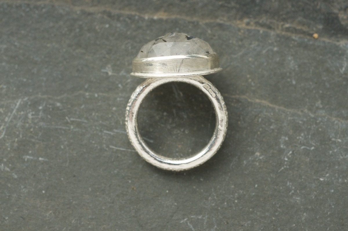 Side view of black mica quartz ring