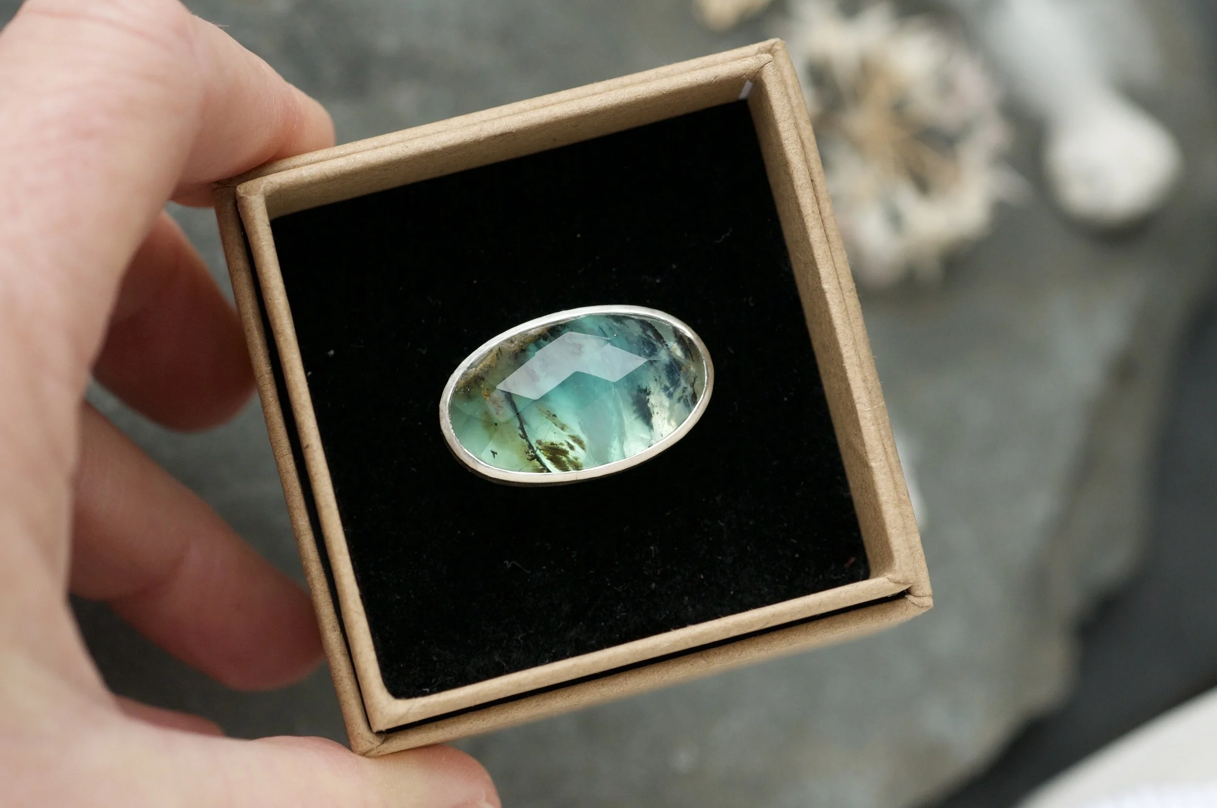 Peruvian blue opal rock pool ring in a box.jpeg