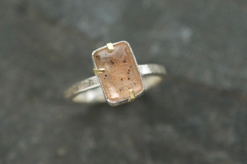 Rainbow lattice sunstone ring with gold claws