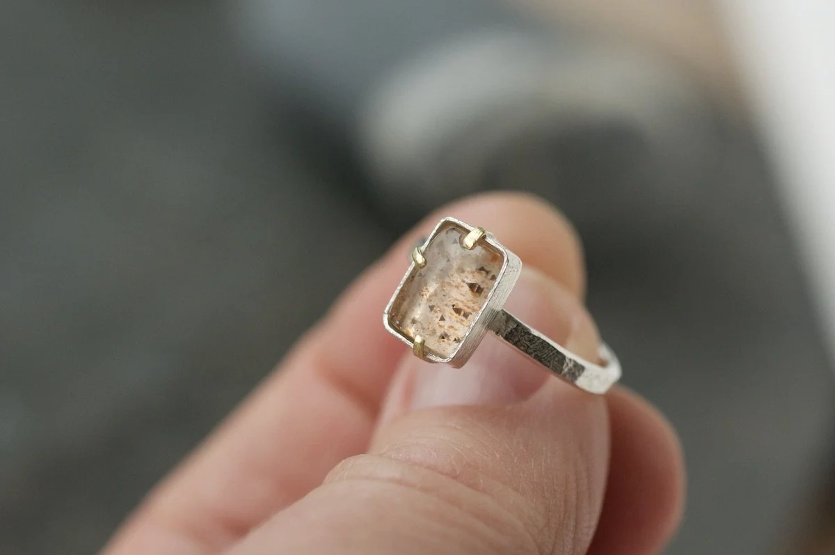 Rainbow lattice sunstone rectangle ring with gold claw setting 3.jpeg