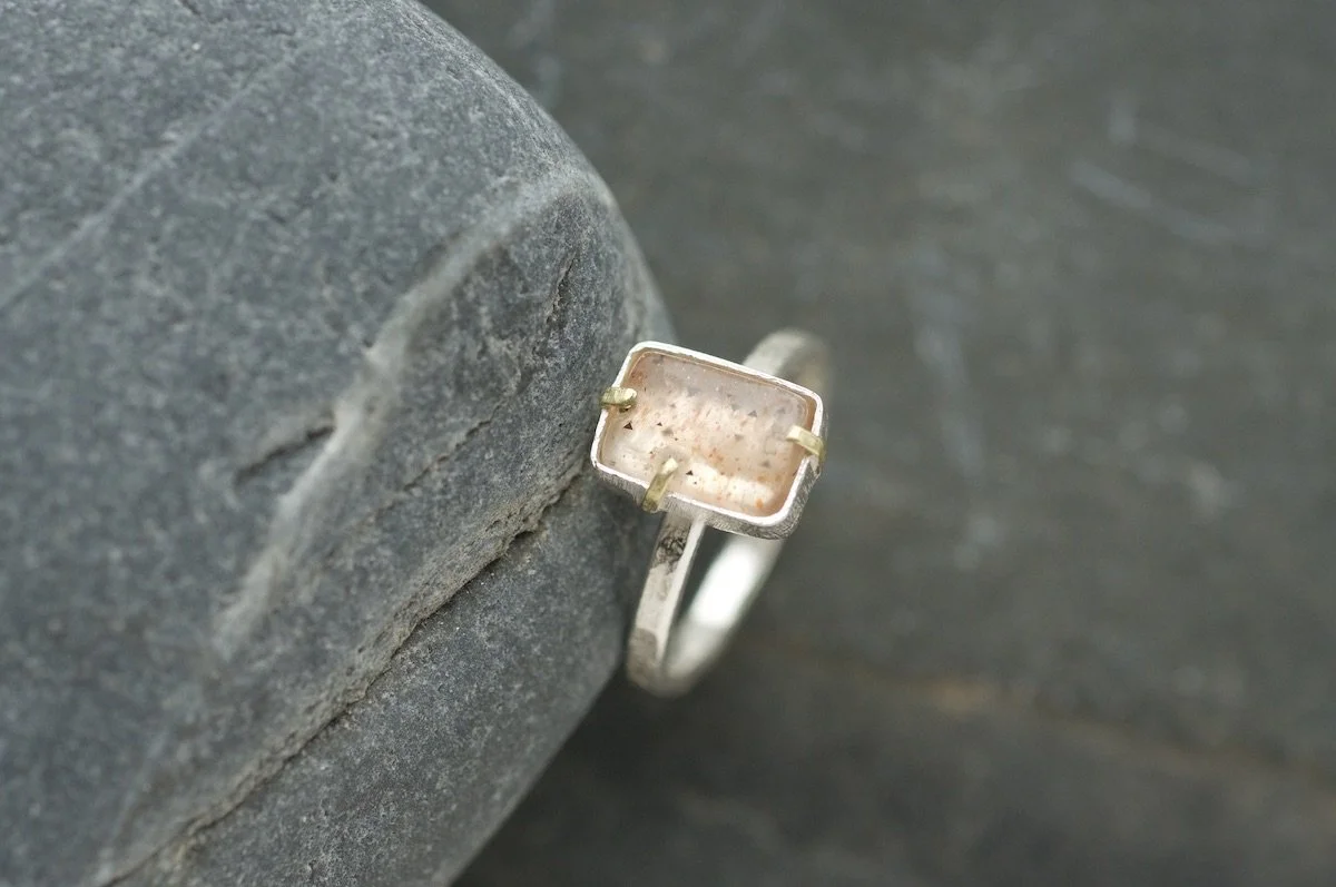 Rainbow lattice sunstone rectangle ring with gold claw setting 2.jpeg