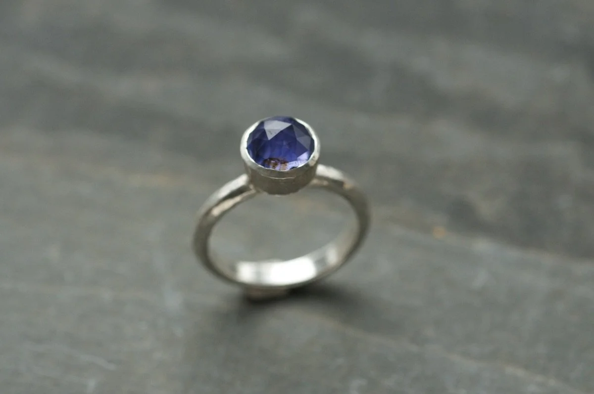 Iolite and silver ring showing faceted  stone.jpeg
