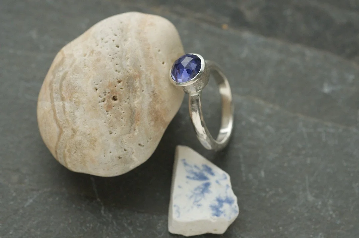 Iolite and silver ring with faceted round stone.jpeg