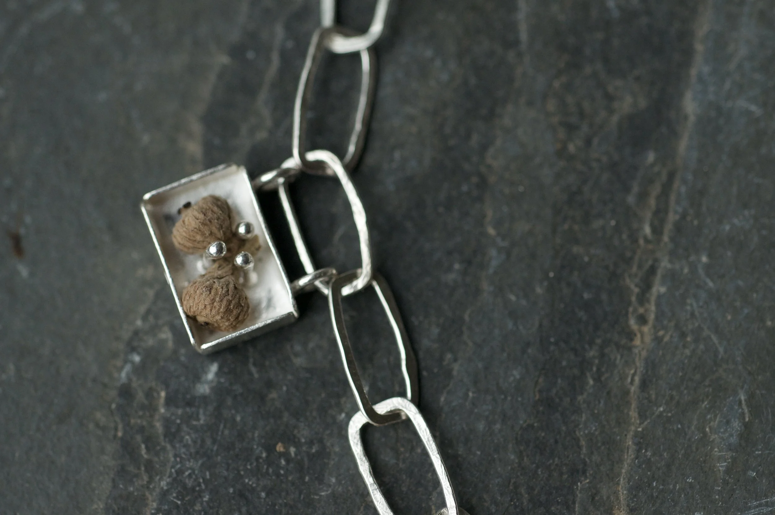 Collectors necklace with box charms acorn.jpeg