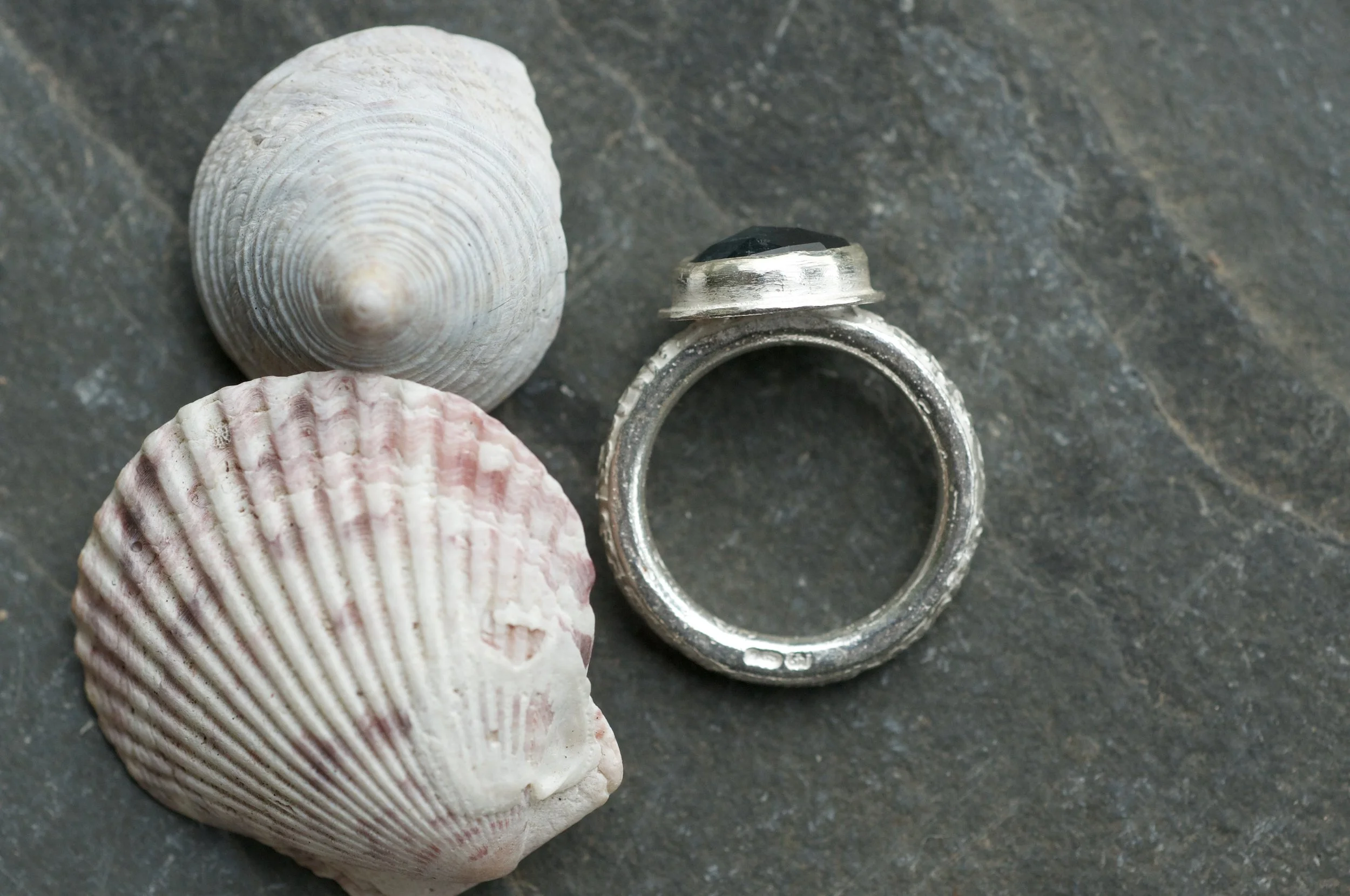 Talisman ring with blue kyanite side view with hallmark.jpeg