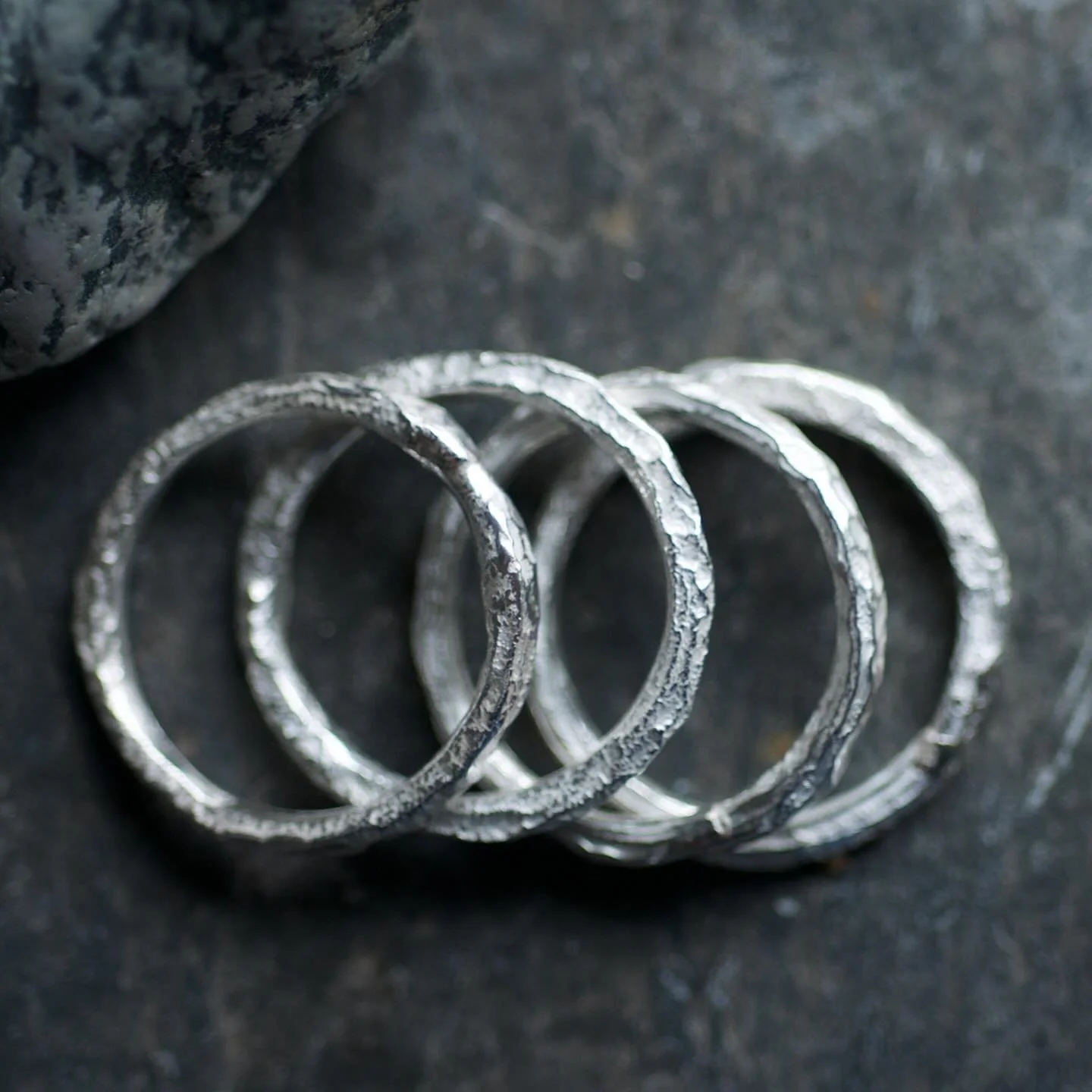 Gnarly, silver, light catching rings.  Each one is unique because it is made by using fire to fuse silver. 

I&rsquo;ve been wearing one for years, I love running my thumb nail over the surface and feeling the texture. Makes me think of my favourite 