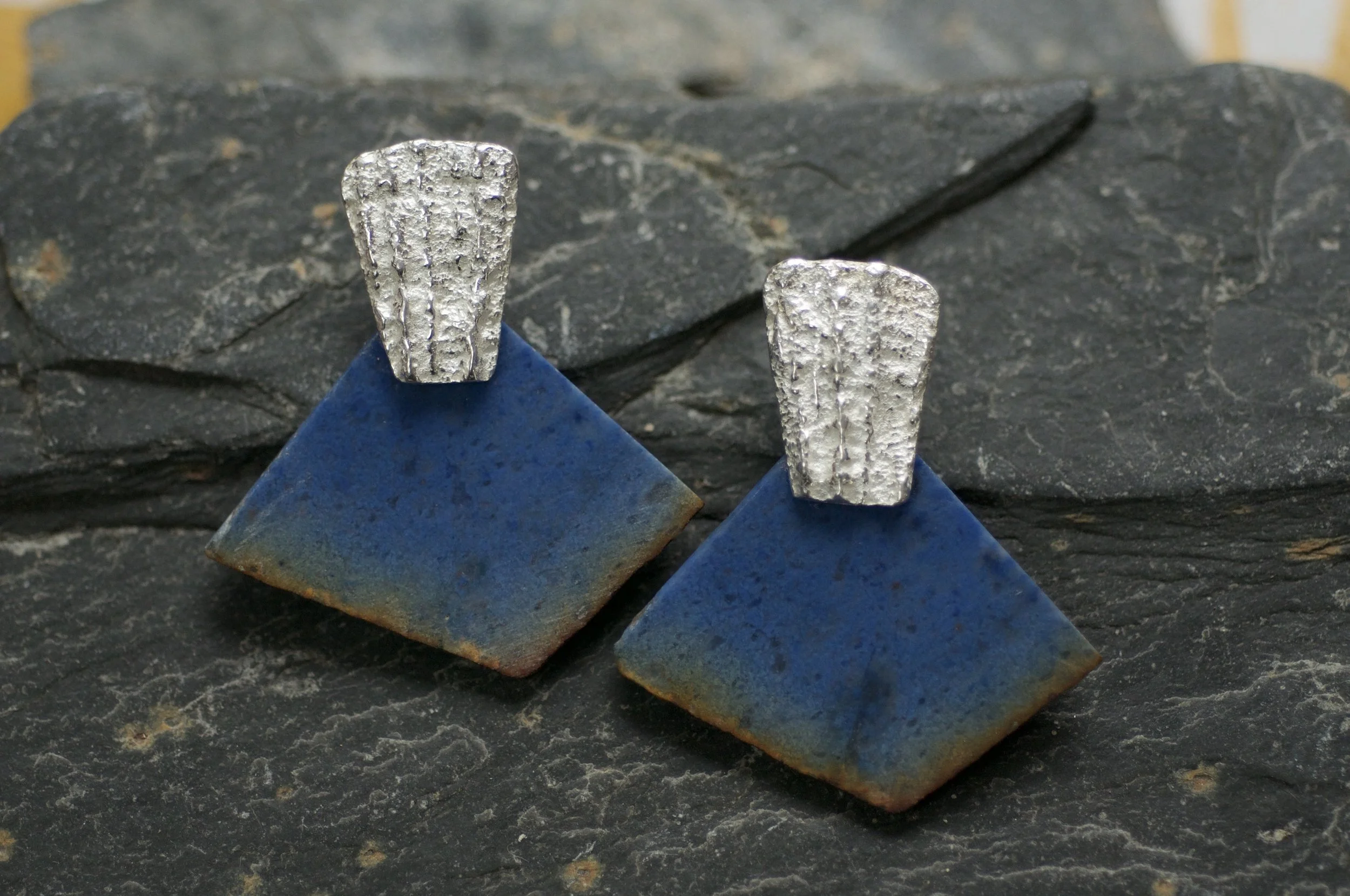 Statement earrings with blue stones