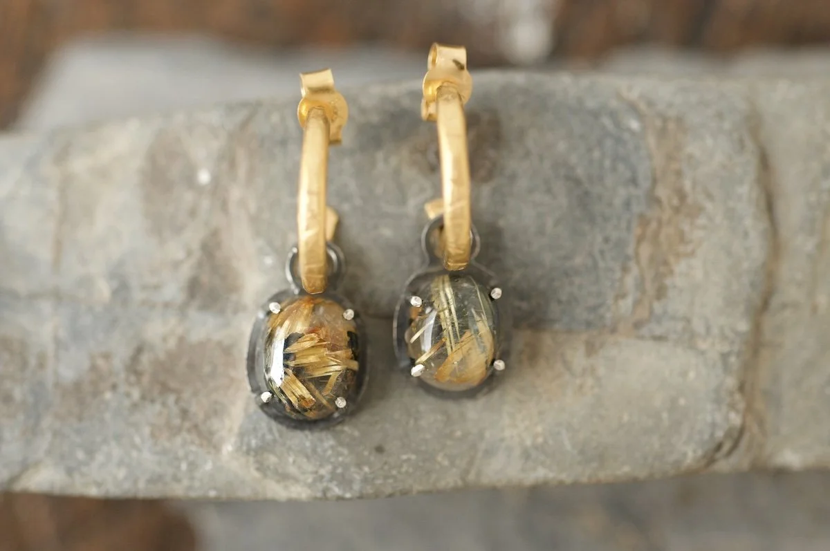 Gold hoop earrings with golden rutile quartz charms