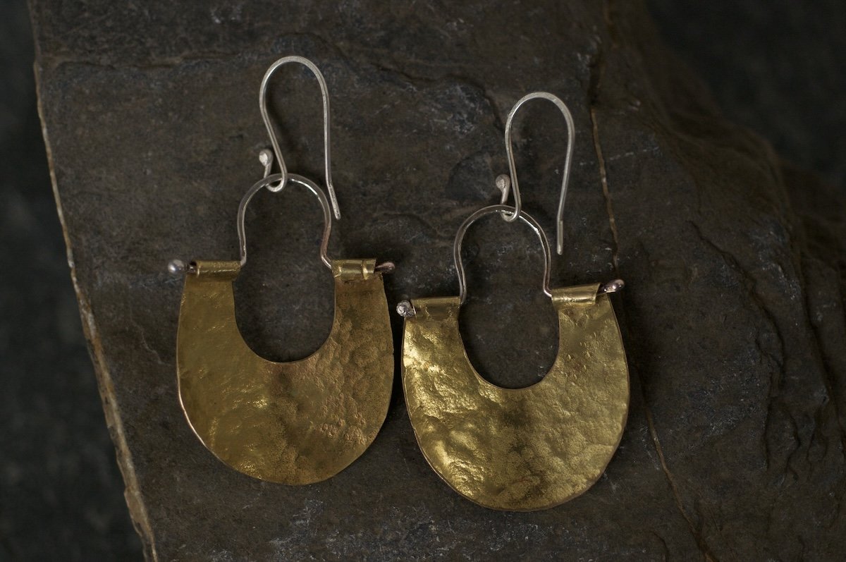 Brass lunula earrings showing the back hammer marks