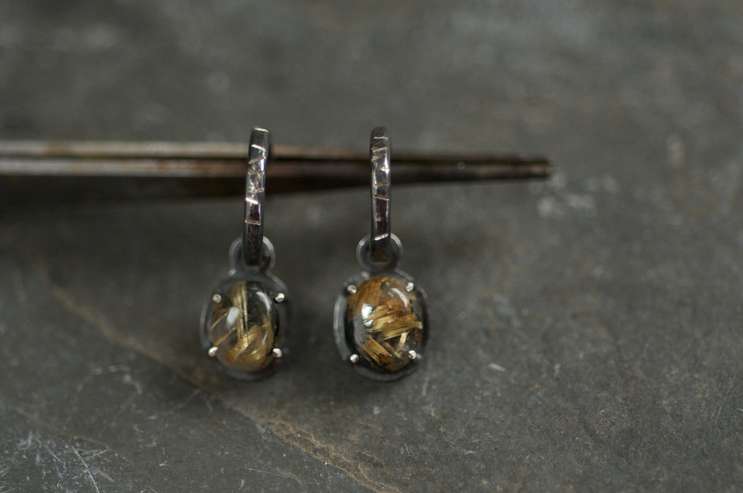 Black and gold hoop earrings