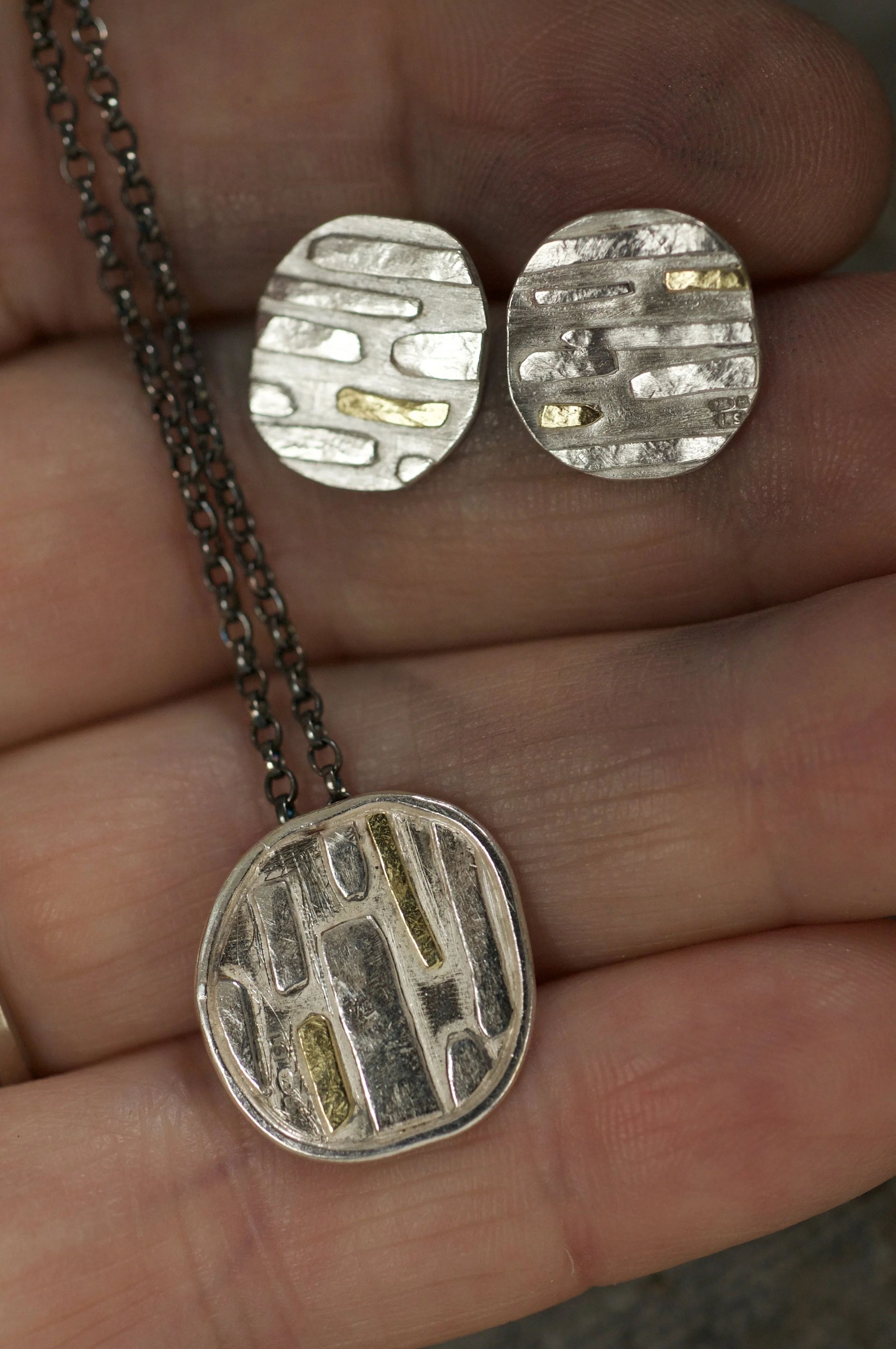 Mylor pebble silver and gold pendant