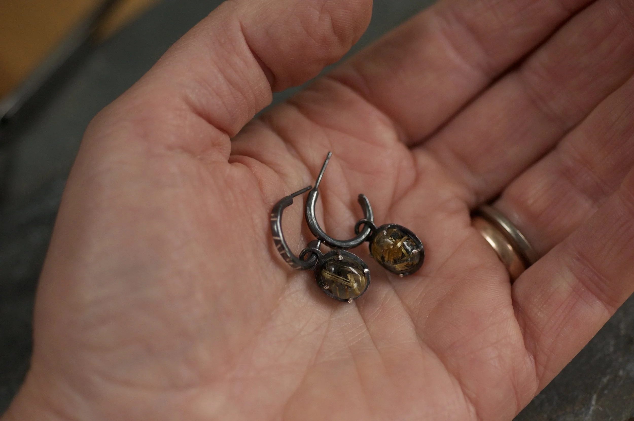 detachable hoops with black and gold drops