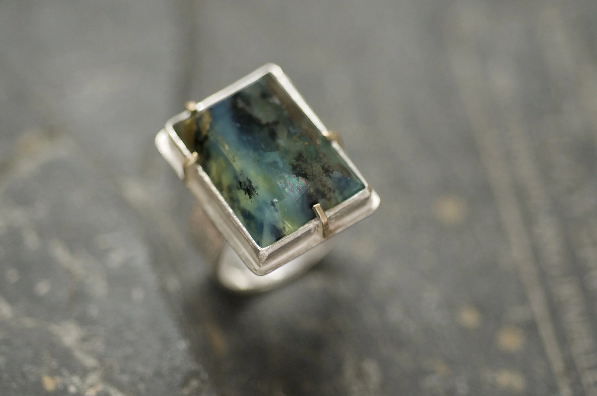 Peruvian Blue Opal statement ring with gold claws.jpeg