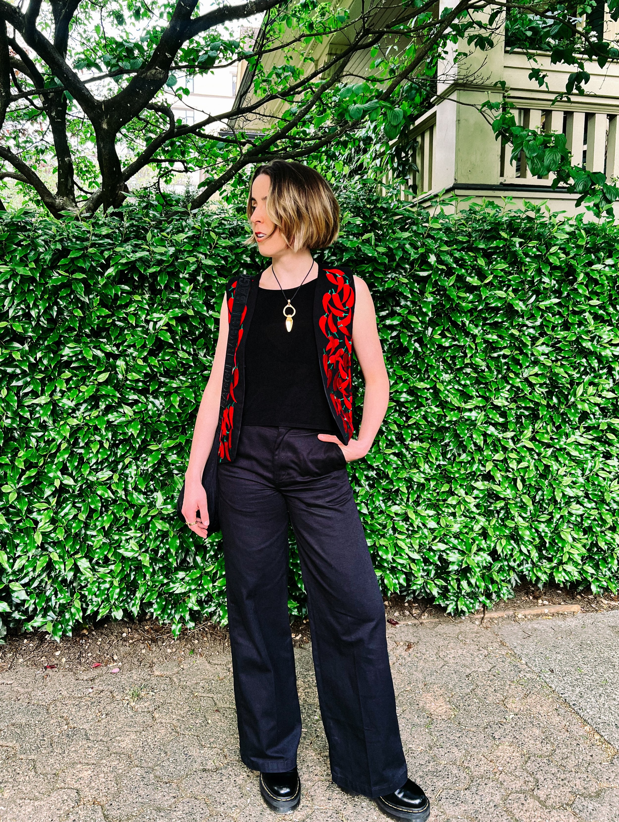 The Scoville scale wasn&rsquo;t ready for this hot pepper stepper. Caution, this outfit&rsquo;s bound to catch heat ⚠️🌶️
&bull;
&bull;
&bull;
Top: @bazaar.toronto 
Pants: @dickies 
Necklace: my grandma&rsquo;s 
Shoes: @drmartensofficial 8053s 

#sus