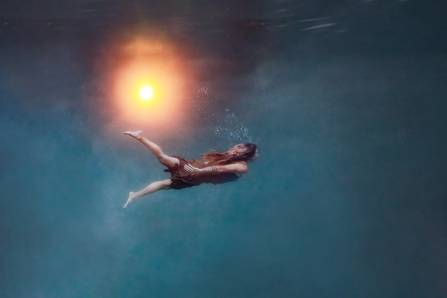 woman-underwater-swimming-strength.jpg