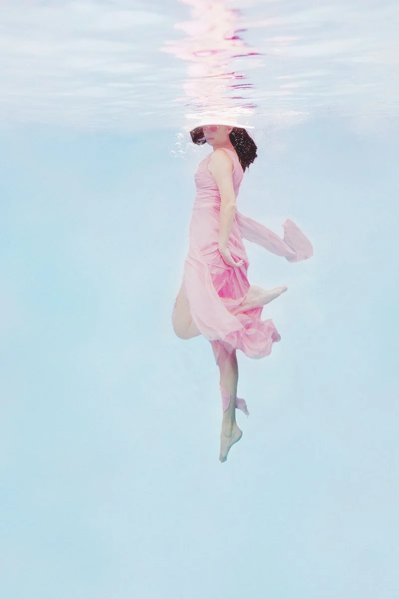 Fine Art Underwater Portrait of a Woman in a Pink Dress