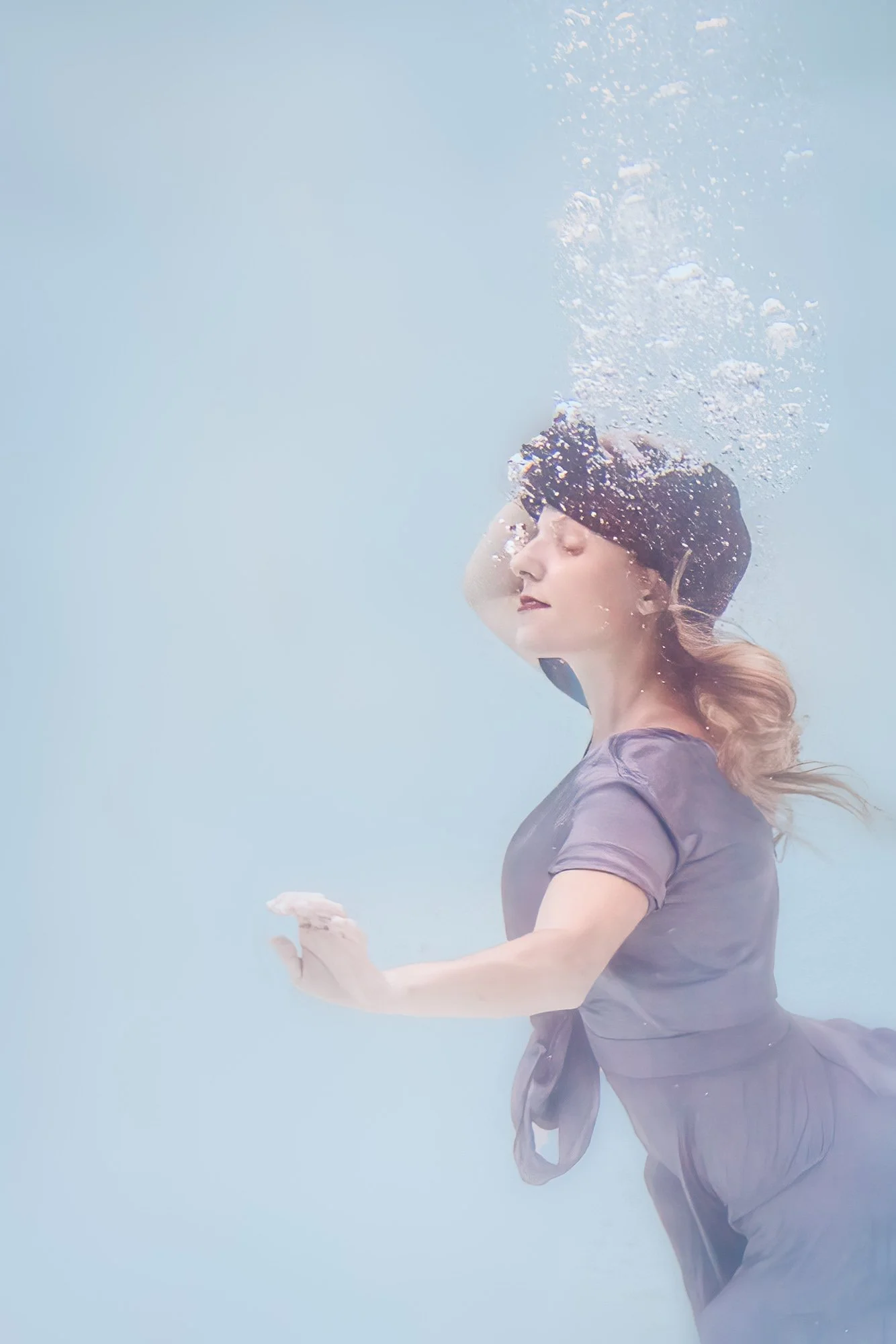 poised-reflection-underwater-woman-bubbles.jpg